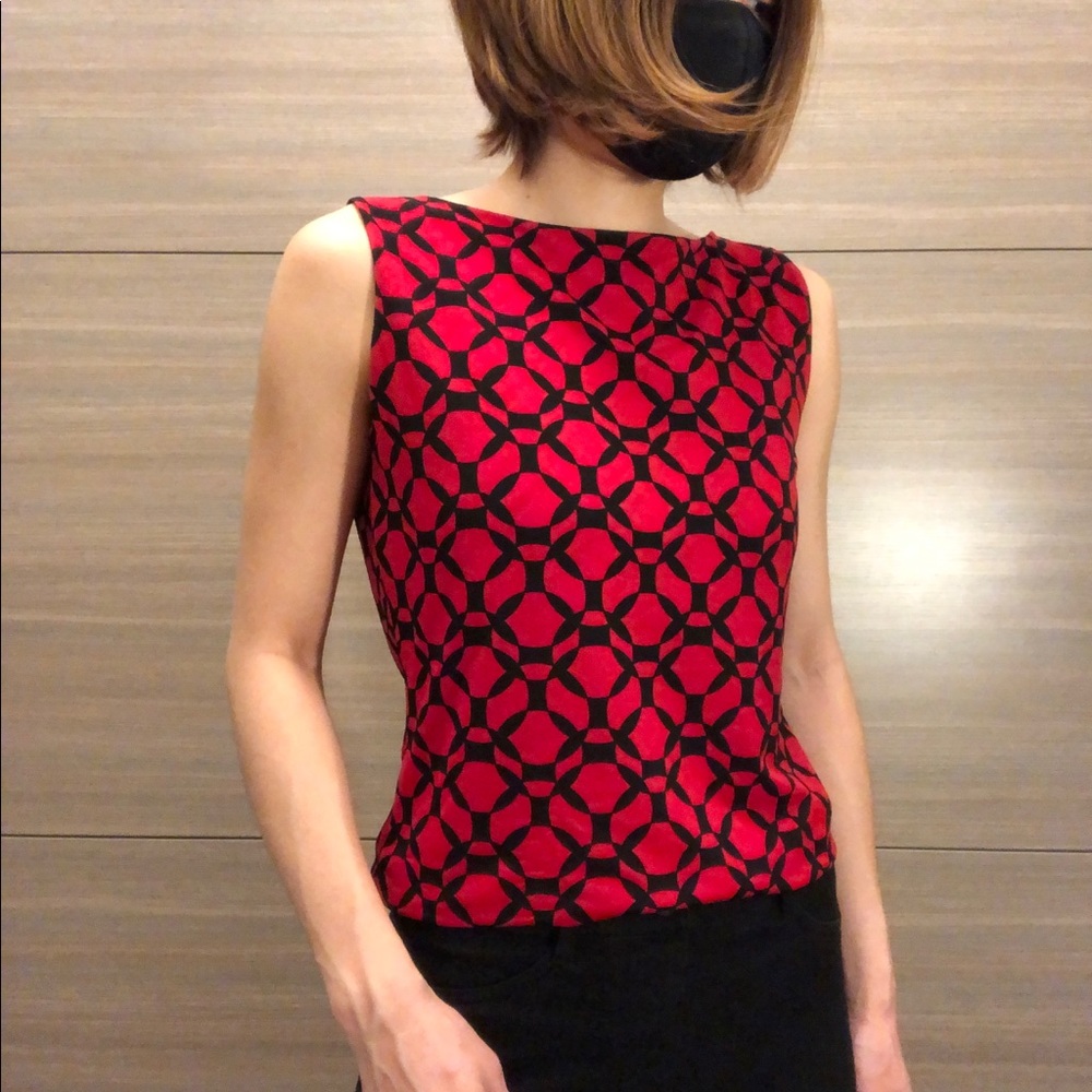 Red and black pattern top.  Sleeveless.  Size small.  Good condition.